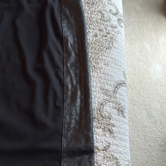 Elegant Black in Black Skirt with Faux Leather Side Detail. - Picture 3 of 6